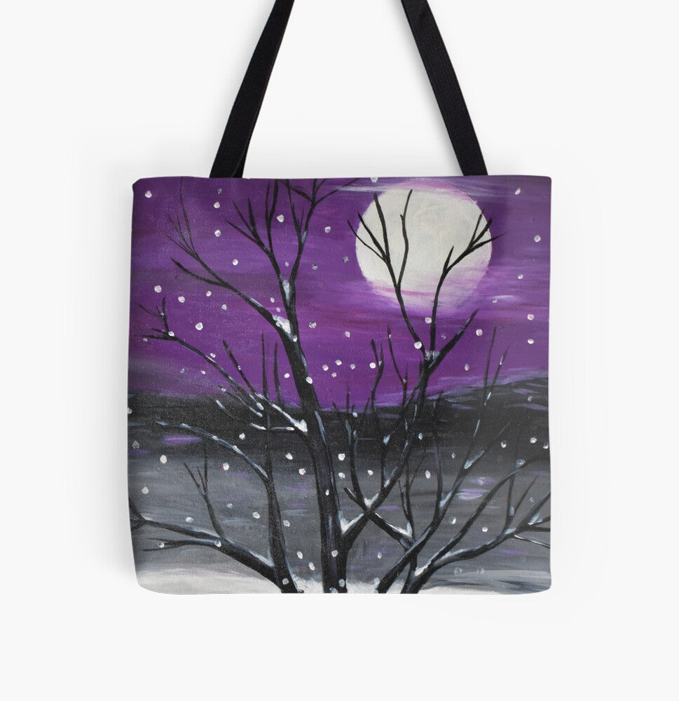 Snow scape scene with a full moon, a black tree on a 41cm x 41cm tote bag